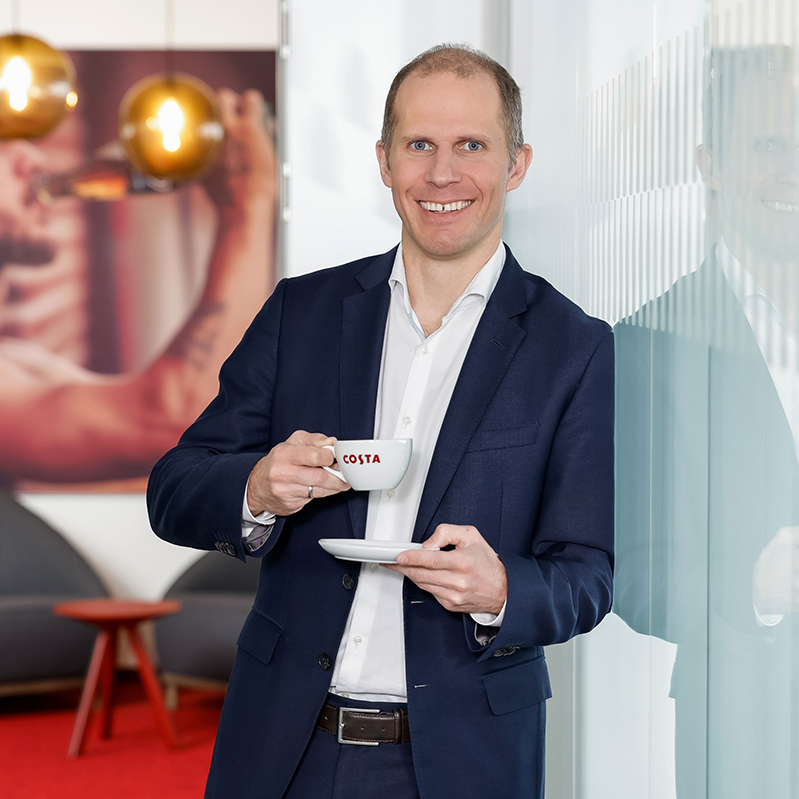 General Manager Herbert Bauer with Costa Coffee cup
